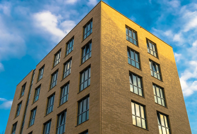 Restored commercial building in Boston with new brick facade.