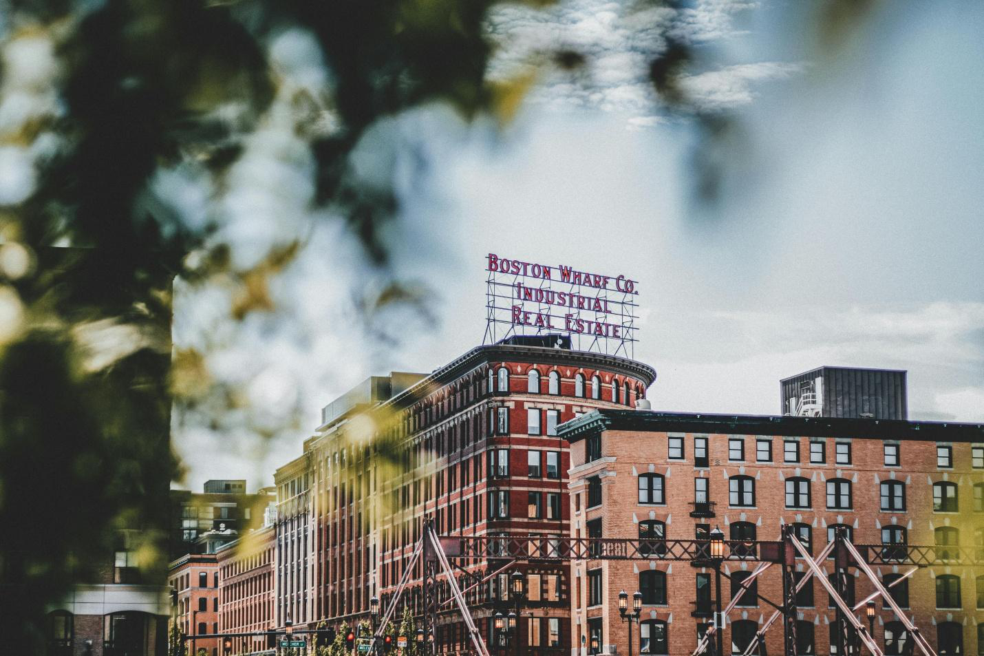 a far shot of red and brown buildings in Boston
