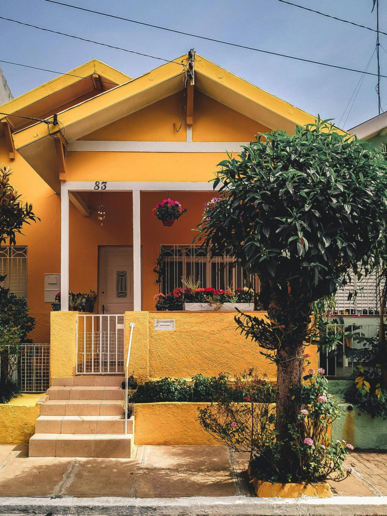 A bright yellow concrete house.