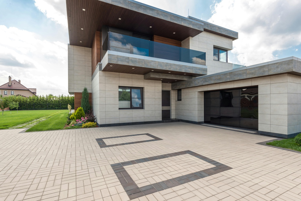 Modern stone patio replacement in Boston is increasing home resale value.