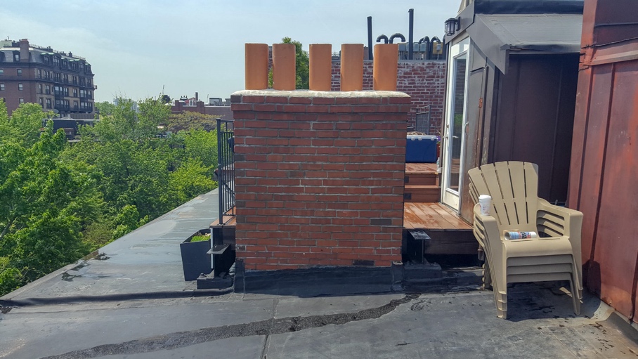 Close-up of mortar being replaced during stone repointing contractor work.