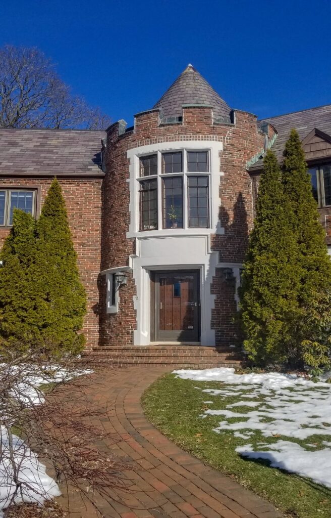 Stone replacement project, reddish brown house