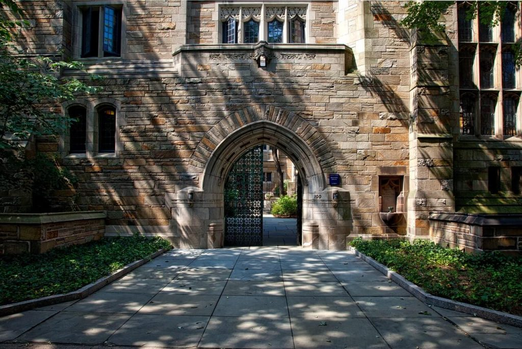 This photo shows a building with a brick wall exterior.