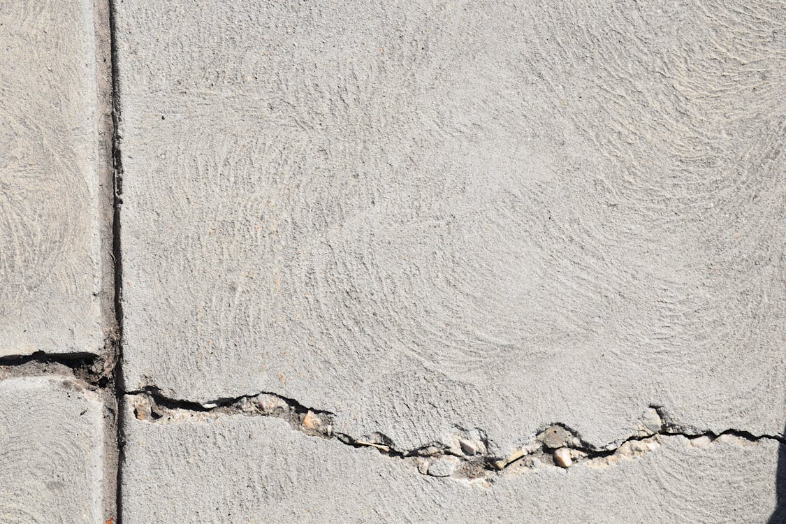 cracked-concrete-wall-in-close-up-photography