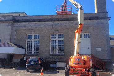 This photo shows a building undergoing some construction work.