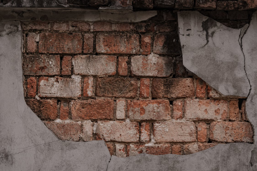 This photo shows an exposed brick wall.