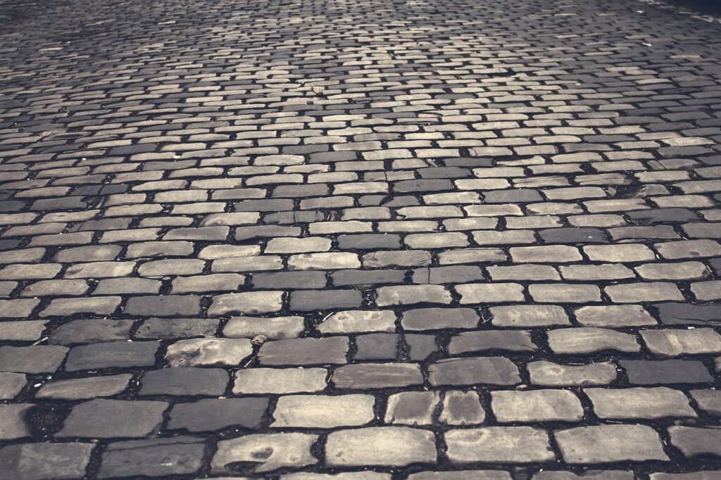 Close-up of a restored stone paver surface showing improved alignment and structural integrity.